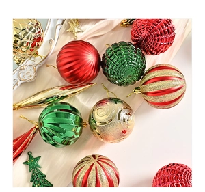 Detailed close-up of decorative Christmas balls with striped, checkered, and glitter patterns