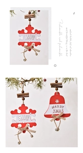 Detail of red and white wooden Christmas ornaments with SNOW and MERRY XMAS text