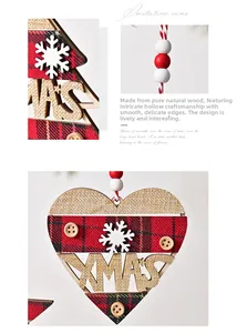 Detail of wooden Christmas ornaments with red plaid fabric and XMAS carving