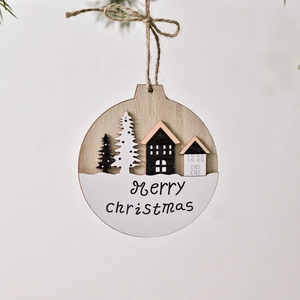 Creative round wooden Christmas tree ornament with house silhouette and Merry Christmas text