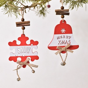 Christmas hollow wooden hanging ornaments set with SNOW and MERRY XMAS text on pine branch