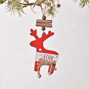 Red wooden reindeer Christmas ornament with hollow star and silver bells on white background