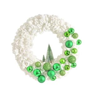 Plush white Christmas wreath decorated with green baubles and miniature pine trees