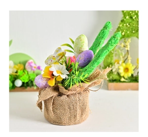 Easter floral arrangement with speckled eggs, rabbit decor and daisies in a burlap pot