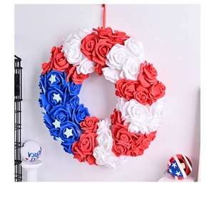 Detail of USA Independence Day wreath with red white and blue foam roses and stars