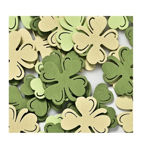 Detailed close-up of colorful laser-cut wooden shamrock slices for St. Patrick's Day DIY