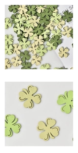 Macro shot of assorted clover wooden chips for St. Patrick's Day party decorations