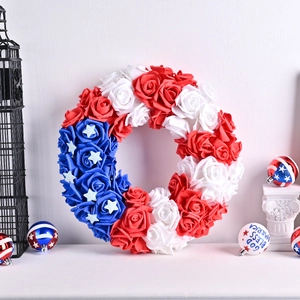 Patriotic USA independence day wreath with red white and blue roses and star decorations