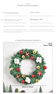 Detail view of 35cm pine needle Christmas wreath with natural cotton and red ornaments