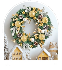 Detail of pine needles and pine cones Christmas wreath with LED lights and golden ornaments