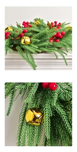 Detail of Norfolk pine garland with red berries and golden bells for Christmas decor