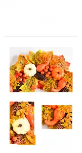 Close-up of autumn wreath with maple leaves, pumpkins and berries for porch decor