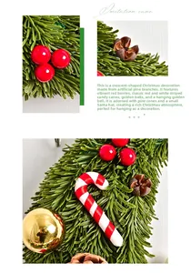Detail of crescent moon Christmas wreath with pine branches, red berries and candy canes
