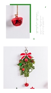 Close-up of a Christmas ornament with pine cones, red bow, and a shiny metal bell
