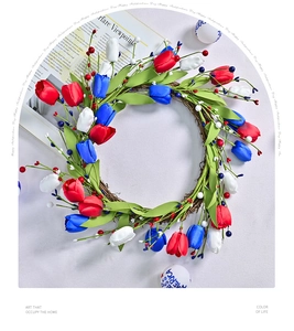 Detail view of red white and blue tulip wreath on rattan base for Independence Day