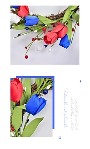 Macro shot of red, white and blue tulips with berries on a grapevine wreath base