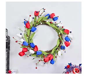 Close-up of red white and blue tulip wreath on a natural grapevine base for Independence Day