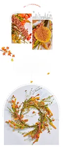 Detailed macro view of maple leaves, orange berries, and gingko leaves on autumn wreath