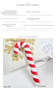 Detail of red and white striped plush Christmas candy cane with gold bell and snowflake