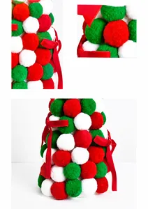 Macro detail of Christmas tree ornament made of red green white polyester plush pom poms