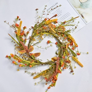 Autumn harvest wreath with orange flowers and lavender on a light gray background