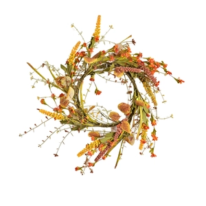 Thanksgiving harvest autumn wreath with eucalyptus leaves and floral accents on rattan base