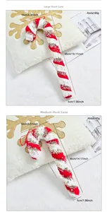 Detail of red and white plush Christmas candy cane ornaments with festive gold sequins