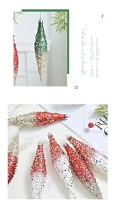 Detailed view of colorful sequined icicle Christmas ornaments with silver caps