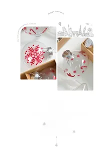 Detailed view of clear PET Christmas ornaments with festive red snowflake patterns