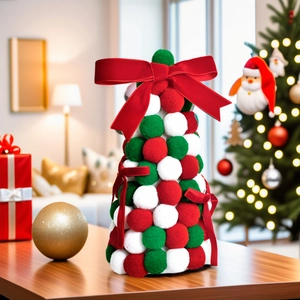 Handmade red green and white pom-pom Christmas tree ornament with a large velvet bow