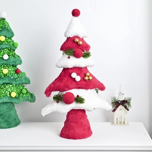 Red and white plush mini Christmas tree tabletop ornament with pine needles and berries