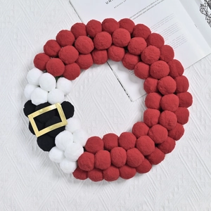 Christmas Santa Claus themed wreath with red white plush balls and golden belt buckle
