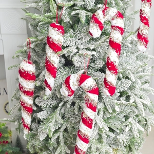 Red and white plush candy cane Christmas tree ornaments with gold snowflake sequins