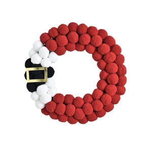Christmas wreath made of red white and black pom-poms with a golden Santa belt buckle
