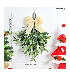 Close-up of olive leaf Christmas wreath with a large burlap bow on white background