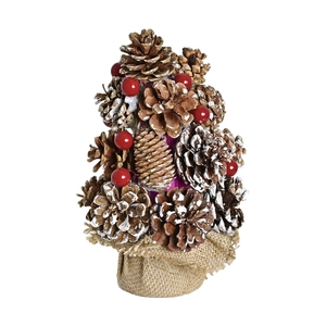 Mini Christmas tree centerpiece with pine cones and red berries on burlap base