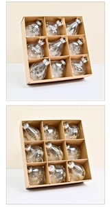 Detailed set of 9 clear teardrop ornaments with gold and silver glitter holiday patterns