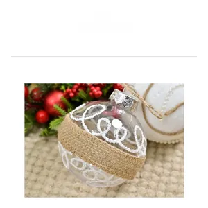 Close-up of a clear Christmas ball featuring burlap wrap and white Love glitter text