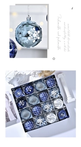 Detailed view of 8cm blue and silver Christmas balls with glitter snowflake patterns