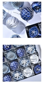 Close-up of 8cm blue and silver Christmas ball ornaments with intricate hand-painted patterns