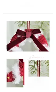 Close-up of red knit Christmas wreath with white fur trim and velvet bow details