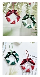 Detail of red and green knitted Christmas wreaths with velvet bows and golden beads