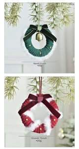 Detail of red and green mini Christmas wreaths with velvet bows and golden bells