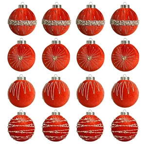 Detail of red velvet Christmas balls with glitter and bead ornaments for tree decoration