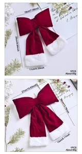 Detail of red velvet Christmas bows with faux fur trim in 25cm and 35cm sizes