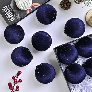 Navy blue velvet Christmas tree balls with silver glitter in elegant gift box setup