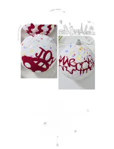 Detail of Christmas foam balls with colorful sequins and red velvet lettering JOY and Merry