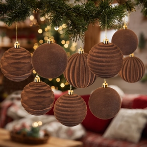 Set of 9 mocha brown flocked Christmas balls with assorted textures on a tree