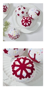 Detail of Christmas foam balls with colorful sequins and red Merry Christmas flocking