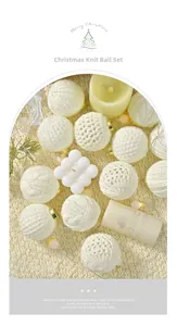 Close-up of knit Christmas ornaments with warm white wool textures and patterns